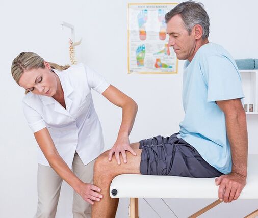 The doctor conducts a visual examination and palpates the patient's knee joint. 