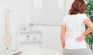 the cause of back pain in women
